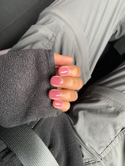 pink jelly nails on hand folded over a black sweater sleeve Clear Pink Jelly Nails, Jelly Watermelon Pink Nails, Neutral Jelly Nails, Hot Pink Jelly Nails, Light Pink Jelly Nails, Pink Jelly Nails Acrylic, Candy Pink Nails, Short Jelly Nails, Jelly Nails Pink