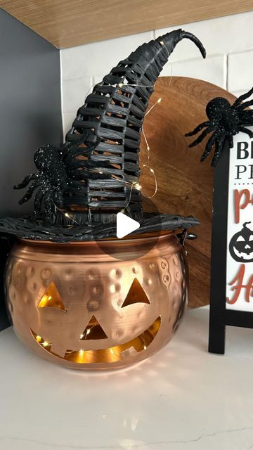 Kristen Blick on Instagram: "LIGHT UP PUMPKIN WITCH 🎃  I found this Copper Jack-o-lantern & Witch Hat from HomeGoods. I decided to turn it into a cute little light up pumpkin witch with twinkle lights from Amazon and this spider decoration I had from last year!   Fun and easy to make! What do you think? …. Follow for more fun this upcoming season & holidays!    #halloweendecoration #halloweendiy #halloweenideas #halloweeniscoming #halloweendiydecor #halloweencountdown #halloween2024 #halloweeninspo #pumpkinseason" Copper Jack O Lantern, Copper Pumpkins, Up Pumpkin, Light Up Pumpkins, Spider Decorations, Instagram Light, Halloween Countdown, Halloween Inspo, Pumpkin Witch