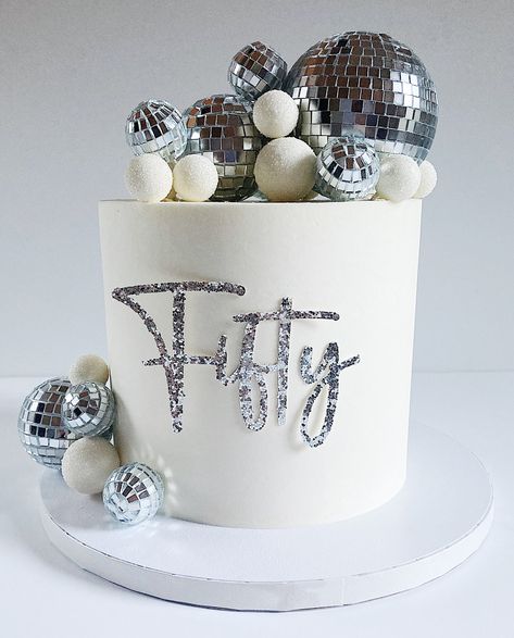 This is one of my favorite cakes that I have made! I think the disco ball theme is so pretty and classy! If you would like your own disco ball themed cake, or another kind of sweet treat, make sure to check out my website and fill out an order form. www.sugarcrumbsllc.com Groovy Disco Cake, Ball Themed Cake, Disco Themed Cake, Disco Ball Theme, Disco Ball Cake, Disco Cake, 30 Cake, Ball Cake, 30th Bday