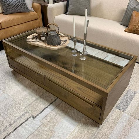 This glass top coffee table offers storage and flare with brass accents! Dimensions: W: 58" D: 28" H: 18"Materials: Oak Veneer, Glass, MetalColors: BrownTrove No. 36729 *All items final sale. Trove policies. Wood Coffee Table With Glass Top, Centre Table Living Room, Outdoor Recliner, Coffee Table With Drawers, Entertainment Table, Chest Coffee Table, Home Office Lighting, Glass Top Coffee Table, Bedroom Bench