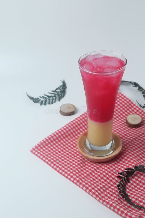 Red soda mixed with milk is a typical Indonesian drink is Soda Gembira stock photos Soda Gembira, Pink Milkshake, A Typical, Mocktails, Juice, Milk, Stock Photos, Fruit, Drinks