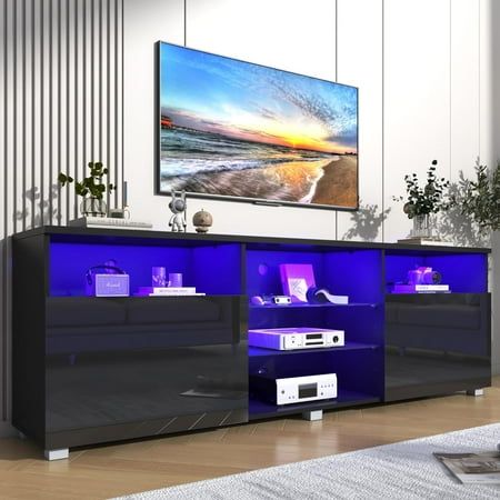 ChVans LED TV stand: A textured TV Stand not only hides your taste, but also contains your living habits and hobbies. Display Modern Entertainment Center, leave enough space for your hobbies. The Entertainment Center TV Stand with LED lights can be a great modern and sleek looking option for any. As for its supported TV size, it can hold up to a 70/75/80 inch TV thanks to its dimensions. And if you wish to store smaller accessories in a safe storage area, then its 2 cabinets can be quite great f 70 Inch Tv Stand, Entertainment Center With Storage, Tv Entertainment Center, Tv Stand With Led Lights, Tv Stand Set, Tv Entertainment Centers, Black Tv Stand, Modern Tv Cabinet, Led Tv Stand