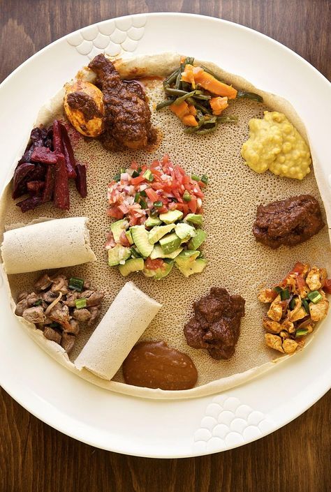 Introduce Yourself to Somali Food With These Popular Recipes Somali Recipe, Somali Food, Ethiopian Injera, Wedding Food Bars, Middle Eastern Food, Vegetarian Italian, Ethiopian Food, Introduce Yourself, Exotic Food