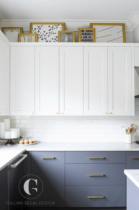 White and gray kitchen design boasting brass hardware- small round brass knobs on white shaker upper cabinets and long brass pulls on flat front lower gray cabinets. Gray Kitchen Design, White And Gray Kitchen, Upper Kitchen Cabinets, Grey Kitchen Designs, White Shaker Cabinets, Gray Cabinets, New Kitchen Cabinets, Gray Kitchen, Grey Kitchen Cabinets