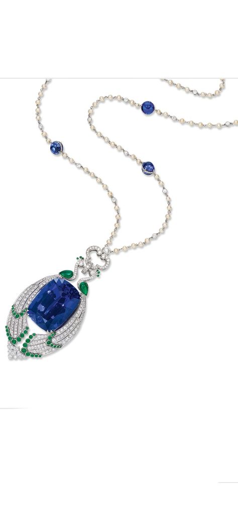 The necklace centring on a tanzanite weighing 90.08 carats, embraced by a pair of peacocks set with circular-cut diamonds and emerald cabochons, to a diamond-set openwork surmount, completed by a platinum neckchain set with seed pearls and collet-set diamonds, interspersed by tanzanite cabochons. Tanzanite cabochons together weighing approximately 24.30 carats. Diamonds and emeralds altogether weighing approximately 6.50 and 2.50 carats respectively. Mounted in platinum. Length approximately 86c Pearl Diamond Pendant, Emerald Cabochon, Tanzanite Necklace, Long Necklaces, Sparkle Jewelry, Mom Jewelry, Emerald Necklace, Cabochon Pendant, Pearl Diamond