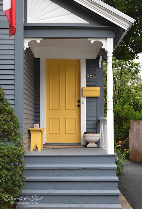 Beautifully restored heritage home in Fredericton, New Brunswick, with a grey facade and a yellow door Yellow Front Door, Exterior Paint Combinations, Exterior Front Door Colors, Exterior Gray Paint, Siding Ideas, Yellow Front Doors, Best Exterior Paint, House Paint Color Combination, Gray House