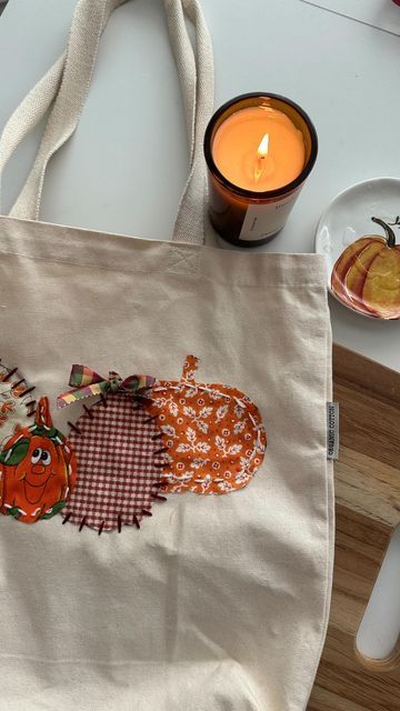 Leah on Instagram: "Cutest lil diy! Super easy too! I will be uploading a full tutorial to my YouTube channel! For supplies needed: Comment TOTE below to receive a DM with the link to shop this post on my LTK ⬇ https://liketk.it/4PCEb

Pumpkin Fall diy tote  #ltkvideo #ltkseasonal #fallvibes #autumn #fallcraft #gilmoregirls #pumpkin #diycrafts #leahsguides" Tote Bag Diy, Fall Tote Bag, Fall Tote, Cozy Life, Diy Tote, Decorating Party, Diy Tote Bag, Bag Diy, Pumpkin Fall