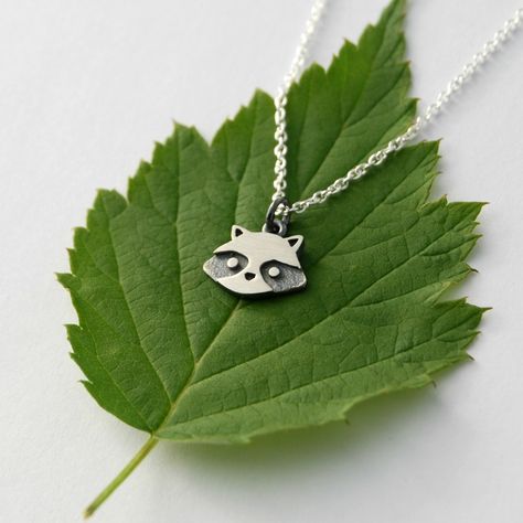 "Here's a itty bitty raccoon pendant. Handmade in sterling silver the sweet little raccoon hangs on a 16\" or 18\" long sterling silver chain and come in a matte brushed or shiny polished finish. The pendant is a little wider than 3/8\" and is 5/16\" wide, please make sure to check the measurements as it may apear bigger on the photos than in real life." Squirrel Jewelry, Raccoon Gift, Woodland Jewelry, Lazer Cut, Funky Jewelry, Welding Art, Clay Ideas, Metal Clay, Pendant Silver