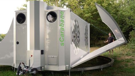 High-tech camper unfolds to reveal a 2-bedroom tiny house - Curbed Two Bedroom Tiny House, Mobile Garage, Small Washing Machine, Fold Out Desk, Fold Down Desk, Outdoor Kitchen Appliances, Green Cat, Front Deck, Casa Container