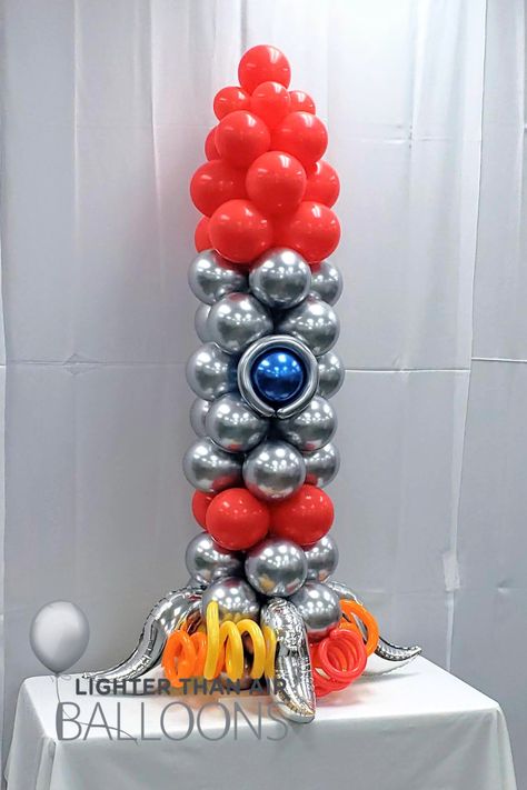 Rocket ship made of balloons, ready to set off into outer space, for birthday party, anniversary and more! Space Balloon Decor, Space Balloons, Rocket Ship Birthday Party, Rocket Balloon, Balloon Rocket, Space Birthday Party, Balloon Centerpieces, Space Birthday, Rocket Ship