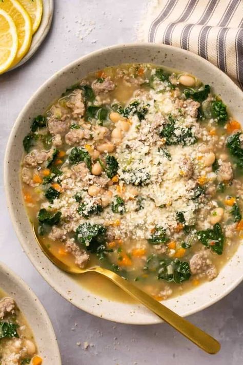 Enjoy an extra cozy and extra delicious meal with this White Bean Kale Sausage Soup. Made with a selection of veggies and Italian sausage, it supplies incredible nutrients and a great dose of protein! Bean Kale Sausage Soup, Kale Sausage Soup, White Bean Sausage Soup, Soup With White Beans, Kale And Bean Soup, White Bean Kale, Kale Sausage, Bean And Sausage Soup, White Bean Kale Soup