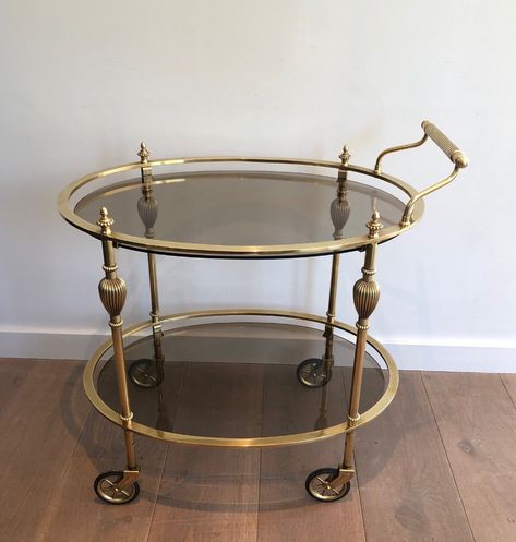 Ovale Brass Drinks Trolley with Smoked Glass Tops - Decorative Collective Dior Price, Brass Bar Cart, Rolling Table, Vintage Serving Trays, Drinks Trolley, Brass Bar, Maison Jansen, Serving Table, French Designer