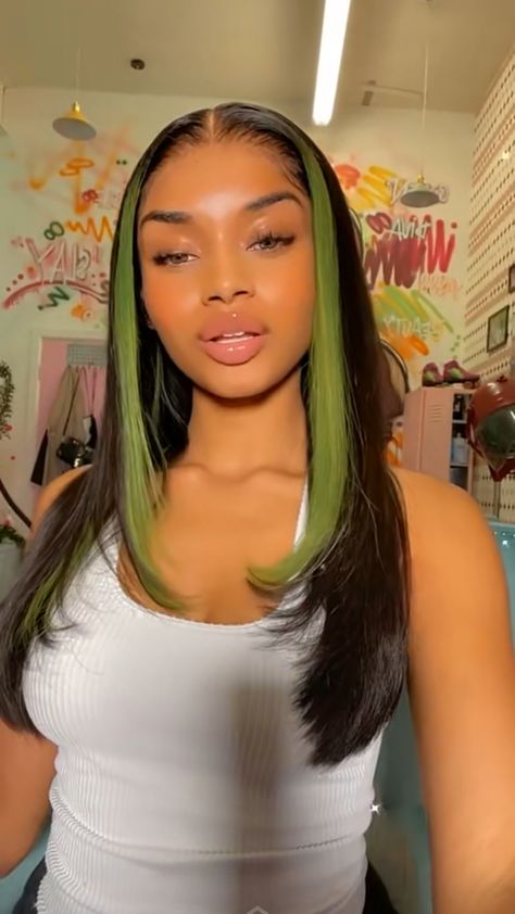 Weave With Green Highlights, Green Highlights Black Women, Skunk Stripe Weave, Green Skunk Stripe Hair Black Women, Green Peekaboo Hair, Green Hair Black Women, Green Skunk Stripe, Black And Green Hair, Jordan Year