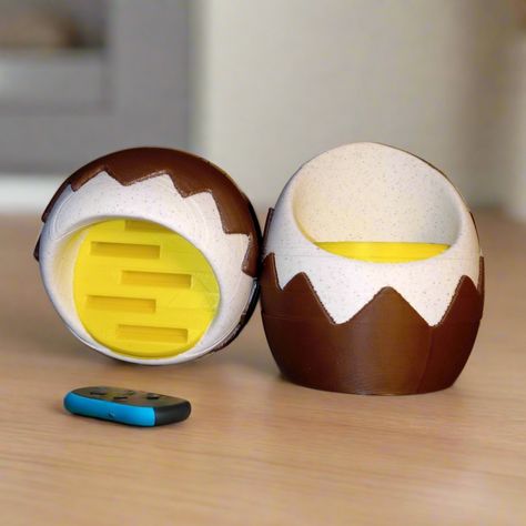 Organize your Nintendo Switch game cartridges in style with this 3D printed egg holder. With a unique shape and strong design, this holder adds a playful touch to your gaming setup. Perfect for storing and displaying your favorite games. #nintendoswitch #storage #3d #eggs #cobotech #case #cobotech #StorageIdeas #organizedhome #GameOn #switchcartridgeholder Nintendo Switch Games, Egg Holder, Gaming Setup, 3d Printed, Nintendo Switch, In Style, 3 D, Nintendo, Egg