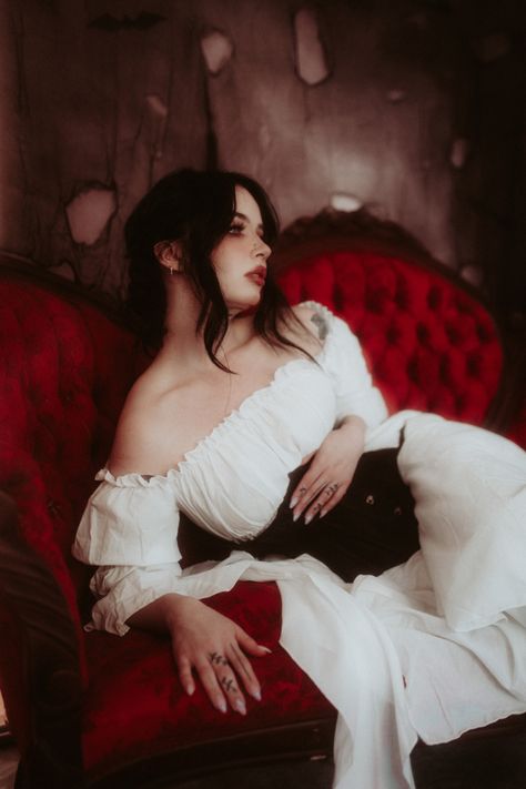 black hair blue eye girl white peasant victorian dress. vampire. behind candelabra Victorian Vampire Aesthetic, Spooky Shoot, Vampire Portrait, Vampire Photo, Wheeling West Virginia, Themed Photoshoot, Victorian Vampire, Vampire Clothes, Vampire Halloween