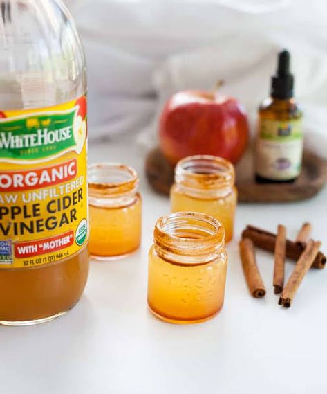 There are so many foods that are so good for us but taste so bad! Apple cider vinegar is one of those drinks that has incredible benefits if consumed on a daily basis, but man, it's hard to drink, am I right? My dilemma is that when the ACV is diluted with a large amount of liquid, it is easier to handle, but who wants to drink an entire glass of bland vinegar? #applecider #drinks Apple Cider Vinegar Shots Recipe, Apple Cider Vinegar Shot, Cider Drink Recipes, Recipe Apple Pie, Apple Cidar Vinegar, Apple Cider Vinegar Supplements, Apple Cider Vinegar Shots, Kahlua Recipes, Make Apple Cider Vinegar