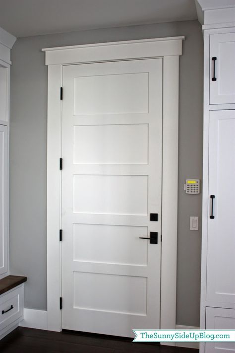 I like this hardware especially entering into the house with bags.... Mudroom Q & A April 25, 2014 by Erin 11 Comments Farmhouse Trim Moldings, Farmhouse Interior Doors, Farmhouse Trim, Interior Door Styles, Interior Door Trim, House Trim, Revere Pewter, Door Casing, White Doors