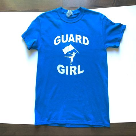 Color Guard Teeshirt In A Gorgeous Blue Coloring With White Letting And Flag Girl. Be Proud To Strut All Your Hard Work Because Color Guard Is Not Just About Dancing As So Much Technique Is Involved. Size S/P; Pit Approx 17" & L 29". Material : Made Of Heavy Cotton. Smoke Free & New Without Tags. Color Guard Shirts, Color Guard, Blue Tshirt, Be Proud, Hard Work, Heavy Cotton, Dancing, Blue White, Tee Shirts