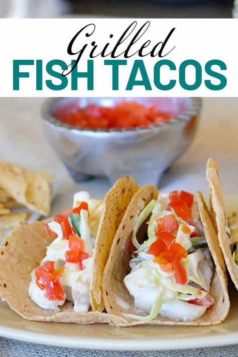 Grilled Chilean Sea Bass Fish Tacos - delicate white fish, mixed with a crunchy sour slaw all wrapped in an earthy corn tortilla. Sea Bass Tacos, Sea Bass Fish, Grilled Fish Tacos, Corn Tortilla, Bass Fish, Cabbage Slaw, White Fish, Grilled Fish, Sea Bass