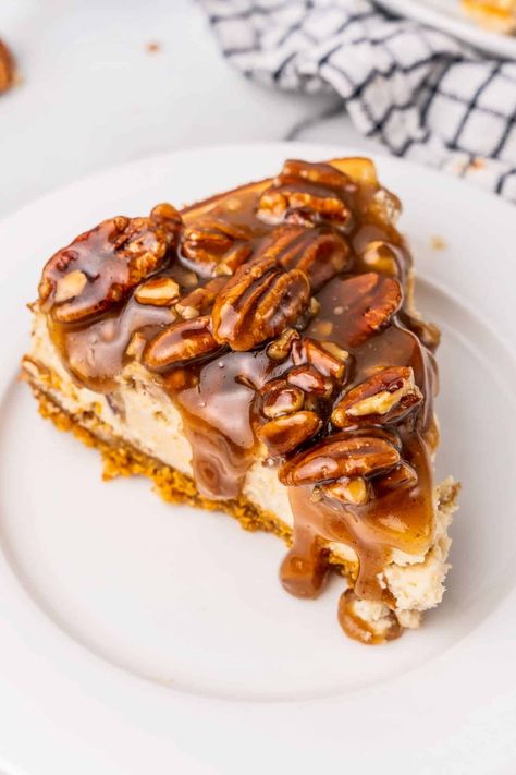 Decadent and delicious Pecan Pie Cheesecake is the perfect combination of a rich, creamy cheesecake with buttery, sweet pecan pie filling. Water Bath Cheesecake, Brown Sugar Cheesecake, Pecan Cheesecake Recipes, Pecan Pie Cheesecake Recipe, Caramel Pecan Cheesecake, Cravings Recipes, Pecan Crust, Pecan Desserts, Cheesecake Layer