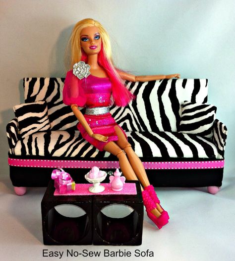 By Starr Durrant If you can cut out some cardboard, glue fabric to it and fold – you will enjoy making these easy and  beautiful Barbie sofas! I was inspired to try this project after watchin… Barbie Couch, Barbie House Furniture, Diy Barbie House, Sewing Barbie Clothes, Diy Barbie Clothes, Barbie Dolls Diy, Diy Barbie Furniture, Barbie Doll House, Barbie Patterns