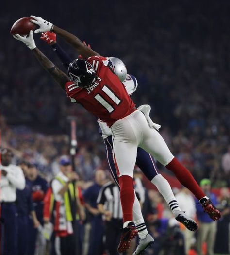 Atlanta Falcons' Julio Jones (11) catches a pass as New England Patriots defender Eric Rowe attempts to stop him during the second half of Super Bowl LI on Sunday, Feb. 5, 2017, in Houston. Julio Jones Wallpaper, Nfl Vikings, Football Pics, Atlanta Falcons Football, Nfl Football Pictures, Nfl Football Art, Texans Football, Julio Jones, Falcons Football