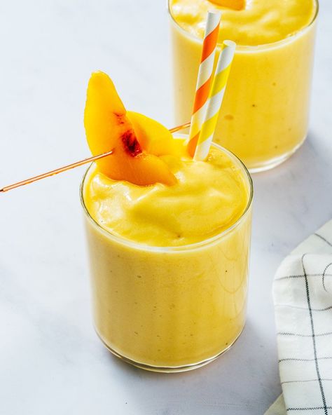 Peach Mango Smoothie Recipe, Strawberry Peach Smoothie, Peach Banana Smoothie, Peach Mango Smoothie, Gum Surgery, Mango Banana Smoothie, Mango Smoothie Recipes, A Couple Cooks, Blueberry Banana Smoothie