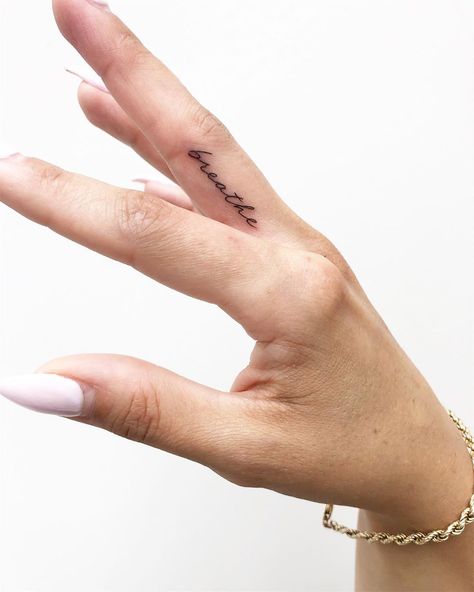 J O J O 🖤 C H R O N I C  I N K on Instagram: “Laura 🖤 #jojochronicink” Finger Ring Tattoo, Arrow Tat, Shoulder Tattoo Quotes, Inside Finger Tattoos, Inner Finger Tattoo, Fingers Tattoo, Ring Finger Tattoo, Gemini Tattoos, Tattoos Ideas For Women