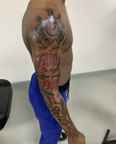 Upper Arm Tats Men, Arm Tattoo Men Black Man, Let Your Faith Be Bigger Than Your Fear Tattoo Men, Freestyle Tattoo For Men, Cool Upper Arm Tattoos, Black Boy Tattoos, Humble Beast Tattoo Men, Forearm Tattoo Black Men, Full Sleeve Tattoos For Guys Black