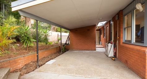 How to convert your carport into an outdoor oasis | Better Homes and Gardens Turning Carport Into Patio, Under Carport Ideas, Carport Converted To Patio, Carport Garden Ideas, Carport Patio Makeover, Carport Transformation Living Spaces, Carport Ideas Decor, Converting Carport To Living Space, Carport Into Patio