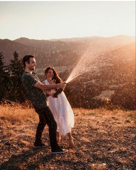 Champagne Anniversary Photo, Couple Photoshoot With Champagne, Popping Champagne Couple Pictures, Engagement Photos Popping Champagne, Engagement Photoshoot Ideas With Champagne, Engagment Photo Champagne, Engagement Photo With Champagne, Engagement Photo Poses Champagne, Couple Dance Photography Poses