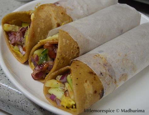 Egg Rolls are one of the most popular street foods in Kolkata. It is prepared with delicious flaky f Green Chili Sauce, Sliced Onion, Egg Wrap, Cucumbers And Onions, Chicken Rolls, Black Salt, Food Crush, Street Foods, Vegetarian Recipe