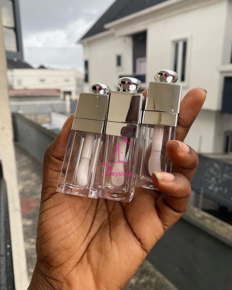 Inspo Tubes🌸 Price👇🏾 # 730(a pcs) Moq -6pcs COLOR- pink Silver Launching your cosmetics venture is now simpler than ever with @zoeys_line handling lip gloss wholesale, branding, packaging, and more. Order exclusively through our website for swift delivery: 3-5 days within Nigeria and 24 hours to 3 days within Benin. #GlamourWholesale #BeautyBulkDeals #CosmeticWholesale #MakeupDistributor #BeautySupplyDeals #WholesaleGlow #BulkBeautyBuys #CosmeticDeals Lip Gloss Tubes Packaging, Lip Gloss Business Ideas, Lip Gloss Business, Lip Gloss Homemade, Career Vision Board, Small Business Plan, Best Small Business Ideas, Small Business Success, Lip Gloss Tubes