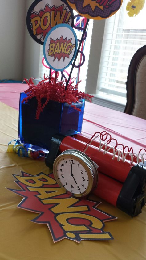 Superhero party centerpiece Superhero Party Table Decor, Superheroes Centerpieces, Superhero Centerpiece Ideas, Avengers Centerpieces Ideas, Superhero Birthday Party Centerpiece, Superhero Party Table Centerpieces, Avengers Table Centerpieces, Superhero Party Table Setting, Superhero Table Centerpiece