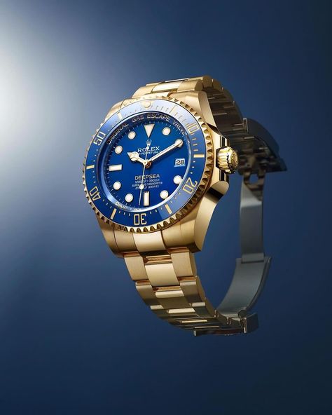 The @Rolex Deepsea is presented in 18 kt yellow gold for the first time, featuring a 60-minute graduated Cerachrom bezel insert in blue ceramic as well as a blue lacquer dial bearing the name ‘DEEPSEA’ in powdered yellow. This new version also incorporates a technical innovation: the high-performance compression ring within the Ringlock system is crafted from blue ceramic. The case back in RLX titanium is edged with fine fluting and hermetically screwed down with a special tool that allows on... Rolex Deepsea Blue, Dark Abyss, Rolex Deepsea, Beauty Technology, Divers Watch, New Rolex, High Technology, Rolex Models, Outdoor Furniture Collections