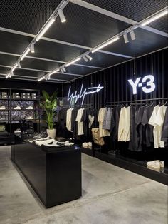 Modern Clothing Store Design Boutique Interior, Adidas Interior Design, Industrial Clothing Store, Streetwear Store Interior, Apparel Store Design, Showroom Clothes, Small Clothing Store Interior, Clothes Showroom, Clothing Boutique Decor