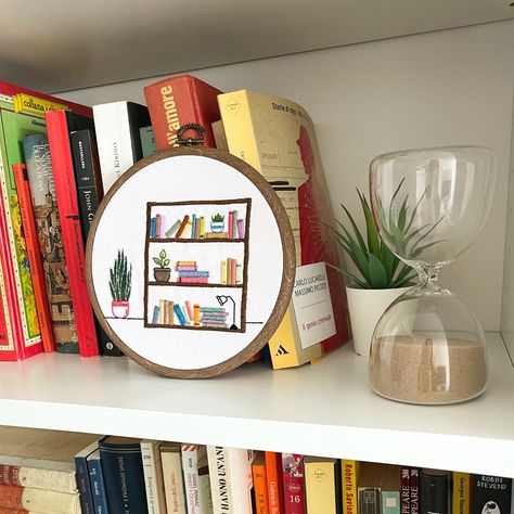 Who loves books? I love reading and I love having books in display, so to honour my bookcase, I decided to create an embroidery hoop. LEVEL: for Beginners who know already the basic embroidery stitches, but embroiderers of any level can have fun with this pattern too! PATTERN SIZE: The pattern is designed to fit a 6” hoop. WHAT IS INCLUDED? 1. Embroidery Basic Stitches: you will find step by step photos to create the basic stitches that you find in the pattern 2. Pattern and instructions Book Embroidery Pattern, Embroidery Basic Stitches, Pdf Pattern Embroidery, Book Embroidery, Library Bookcase, Basic Embroidery, Digital Embroidery Patterns, Basic Stitches, Basic Embroidery Stitches