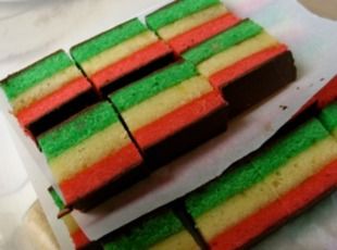 Italian Rainbow Cookies Recipe | Just A Pinch Recipes Rainbow Cookies Recipe, Italian Rainbow Cookies, Kek Lapis, Italian Christmas Cookies, Italian Cookie Recipes, Rainbow Cookies, Italian Christmas, Italian Cookies, Xmas Cookies