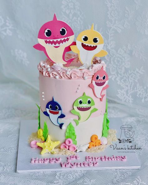 Baby Shark Cake for a little girl turning 1st #birthdaycakes #cupcakes #buttercreamcakes #fondantcakes #customcakes #handmadetopper #cakedecor #cakedesign #sydneycake #sydneycakes #vaanskitchen #spongecake #babysharkcake #babysharkcakes Baby Shark Birthday Party Girl Cake, Baby Shark Girl Birthday Party, Baby Shark Cake Pops, Baby Shark Cake Girl, Baby Shark Birthday Party Girl, Shark Cake Pops, Baby Shark Cake, Fondant Cake Tutorial, Doll Birthday Cake