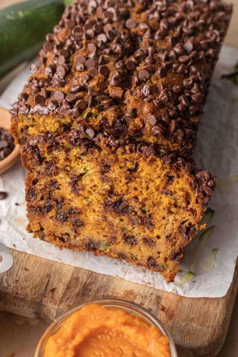 Treat yourself to a good-for-you Pumpkin Zucchini Bread that sneaks veggies into each flavorful bite! Easy to make using pumpkin puree, maple syrup, and zucchini. Pumpkin Zucchini Bread, Bread Zucchini, Pumpkin Zucchini, Spiced Zucchini, Bread Pumpkin, Vegan Pumpkin Bread, Pumpkin Chocolate Chip Bread, Pumpkin Pie Mix, Pumpkin Bread Recipe