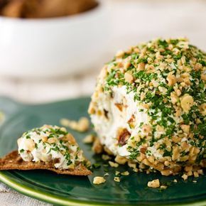 Cheese balls were all the rage in the 1970s, an easy, tasty, fab party food for any occasion. What's old is now retro-chic—this lightened-up cheese ball seduces with the sweetness of dates, the savory bite of blue cheese, a hint of shallot, and a teasing whiff of lemon zest. Blue Cheese Ball Recipe, Blue Cheese Ball, Cheese Ball Recipes, Cheese Ball, Appetizer Dips, Blue Cheese, Cooking Ideas, Appetizer Snacks, Salmon Burgers