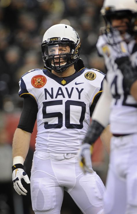 U.S. Navy Midshipman Brye French, a linebacker with the U.S. Naval Academy football team, watches the U.S. Military Academy's offensive team during the 113th Army vs. Navy football game at the Lincoln Financial Field in Philadelphia, Pa., Dec. 8, 2012. (DoD photo by Marvin Lynchard/Released) Army Vs Navy Football, Army Navy Football, Army Vs Navy, Academy Football, College Football Uniforms, Academy Uniforms, Navy Football, Lincoln Financial Field, Navy Boys