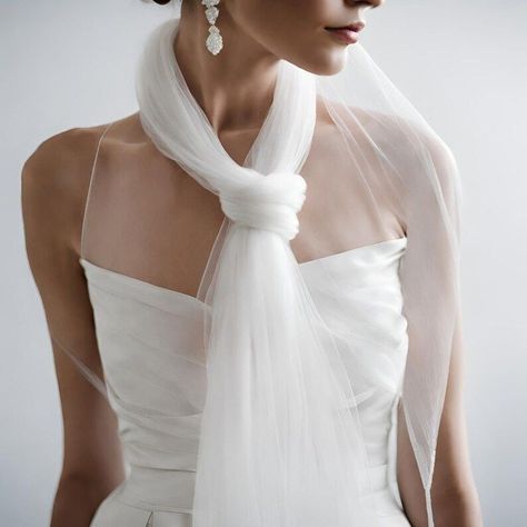 Give a simple look major personality with a bold, swoon-worthy bridal cape for your wedding dress. This modern take on the more classic veil is meant for daring brides who are known for fashion-forward surprises and drama. Whether you stud your cape in pearls, do a patterned celestial-inspired star design, or go for a more simple tulle bridal cape, you are sure to add the drama. Long Silk Neck Scarf. Cape Veils, Classic Veil, Wedding Cape Veil, Bridal Scarf, Draping Wedding, Wedding Dress Tulle, Wedding Scarf, Veil Styles, Silk Neck Scarf