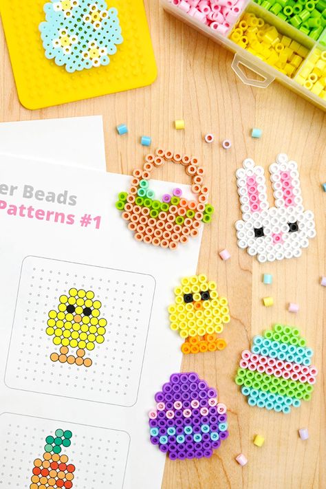 These Easter Perler bead patterns are SO CUTE and fun to make! Use our free printable patterns or design your own and make Easter pixel art in less than 15 minutes. It's a fun spring activity for birthday parties or sleepovers and such a cool craft for kids, tweens, teens, and adults! Perler Bead Bunny Patterns, Easter Melty Bead Patterns, Easter Egg Perler Bead Patterns, Birthday Perler Bead Patterns, Egg Perler Bead Patterns, Hama Beads Patterns Easter, Perler Bead Easter Patterns, Spring Perler Bead Patterns, Fruit Perler Beads