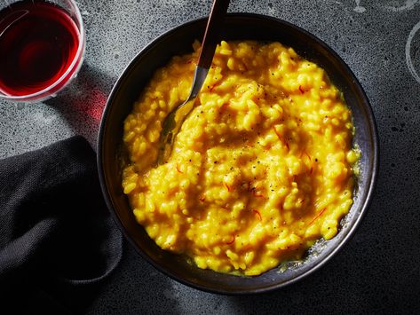 Saffron, wine, and beef tallow enrich this golden risotto with comforting flavor. Get the recipe at Food & Wine. Zucchini Risotto, Bacon Risotto, Vegetarian Risotto, Saffron Risotto, Risotto Milanese, Creamy Zucchini, Mushroom Risotto Recipes, Chicken Risotto, Butternut Squash Risotto