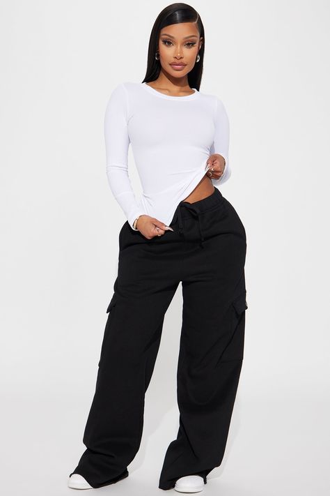 Available In Black. Wide Leg Pant Cargo Back Screen Stretch Disclaimer: Due To The Specialized Screen Printing Process A Difference In Saturation May Occur. Each Garment Is Unique. 50% Cotton 50% Polyester Imported | Enjoy The View Cargo Pant in Black size Large by Fashion Nova Book Closet, Modeling Clothes, Glam Closet, Yodit Yemane, Cargo Outfit, Blouses Designs, Hype Clothing, Fashion Nova Outfits, Effortlessly Chic Outfits