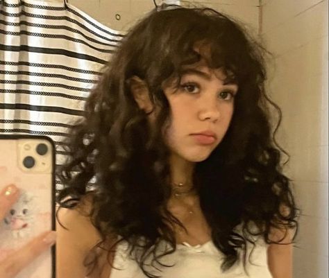 Shaggy Curly Wavy Hair, 70s Style Curly Hair, Full Bangs Curly Hair, Curly Perm Women, Types Of Bangs For Wavy Hair, Curly Hairstyles 70s, Sock Curls On Curly Hair, Medium Length Wavy Haircut With Bangs, Dark Curly Hair With Bangs