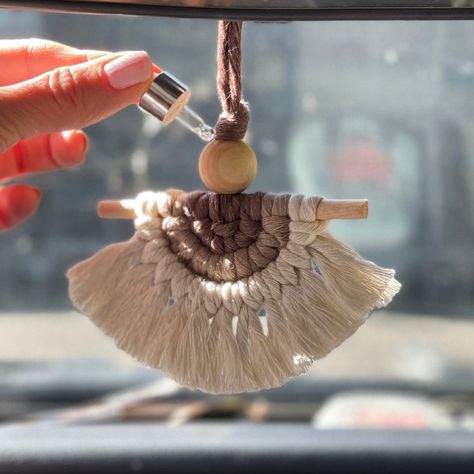 Ready to give your car some boho flair? 🚗✨ This cute little macrame car charm is all you need to add a touch of personality to your ride. Perfect for those chill road trips or just cruising around town. Who else needs one of these hanging from their mirror? 🌿🚙 #macramevibes #cardecor #bohostyle #essentialoillover #artizinstudio Macrame Car Charm, Macrame Ornaments, Cactus Blossom, Eucalyptus Lavender, Mini Macrame, Car Smell, Christmas Card Crafts, Christmas Gift Basket, Macrame Ideas