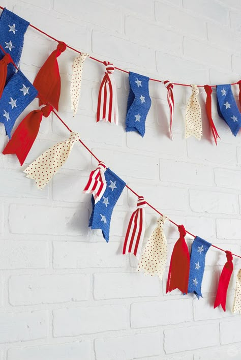 Make a July 4th ribbon garland to decorate your Independence Day celebration—all you need is red, white, and blue ribbon and a few other craft supplies. Diy Slinger, Red White And Blue Party, White And Blue Party, Fourth Of July Decorations, 4th July Crafts, Independance Day, Fourth Of July Food, Ribbon Garland, Fourth Of July Decor