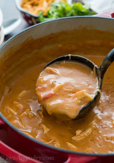 This Cheesy Chicken Enchilada Soup is so good! My whole family LOVED this super simple dinner recipe! Cheesy Chicken Enchilada Soup, Copycat Chilis Enchilada Soup, Queso Velveeta, Chilies Chicken Enchilada Soup Copycat, Copycat Chili's Chicken Enchilada Soup, Chili’s Copycat Chicken Enchilada Soup, Chicken Enchilada Soup Recipes, Enchilada Soup Recipe, Cheesy Chicken Enchiladas